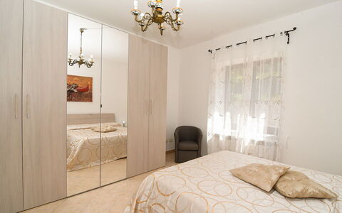 Villa del Mare: Furniture, Bed, Interior Design, Bedroom, Wood, Flooring, Floor, Room, Cabinetry, Bed Sheet