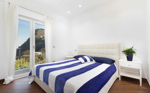 Villa del Saraceno: Bed, Furniture, Bedroom, Interior Design, Bedding, Bed Sheet, Wood, Linens, Floor, Flooring