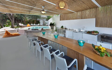 Villa delle Sirene: Furniture, Interior Design, Ceiling, Chair, Table, Countertop, Resort, Houseplant, Kitchen & Dining Room Table, Kitchen