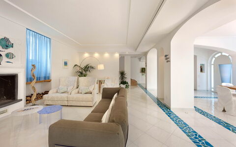 Villa delle Sirene: Flooring, Interior Design, Floor, Furniture, Ceiling, Couch, Lighting, Room, Apartment, Living Room