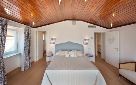 Villa delle Sirene: Furniture, Interior Design, Wood, Ceiling, Floor, Flooring, Bed, Textile, Bedroom, Room