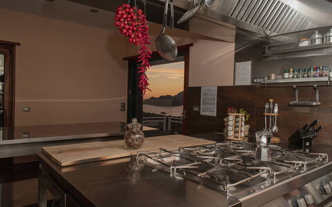 Villa Felicia: Kitchen, Interior Design, Wood, Countertop, Furniture, Flooring, Ceiling, Lighting, Kitchen Appliance, Light Fixture