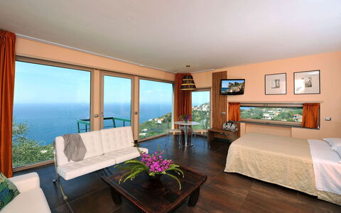 Villa Felicia: Furniture, Interior Design, Room, Floor, Table, Flooring, Chair, Comfort, Ceiling, Resort