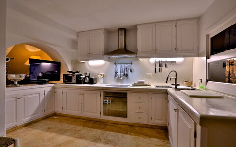 Villa Gold: Kitchen, Countertop, Kitchen Appliance, Cabinetry, Interior Design, Major Appliance, Furniture, Light Fixture, Lighting, Ceiling