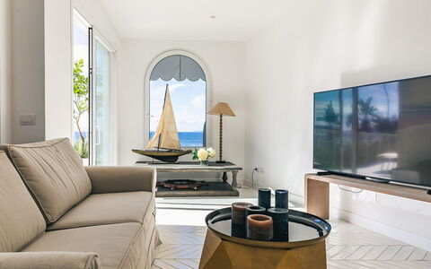 Villa Heart: Furniture, Interior Design, Flooring, Floor, Sea, Living Room, Room, Ocean, Couch