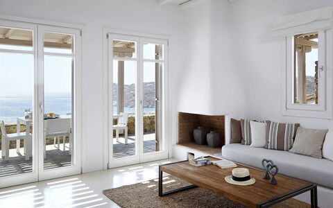 Villa Helios: Furniture, Flooring, Interior Design, Floor, Wood, Table, Home, Room, Chair, Sea