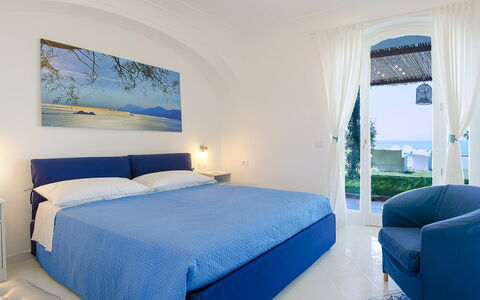 Villa Il Sogno di Praiano: Blue, Furniture, Interior Design, Floor, Bedroom, Sea, Bed, Room, Ceiling, Bedding