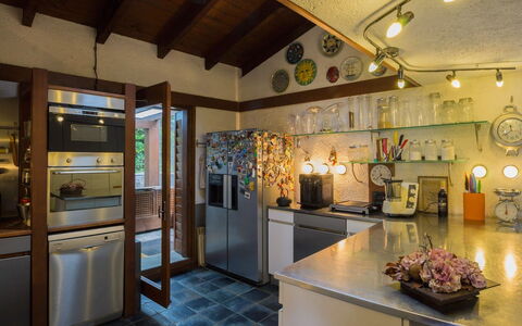 Villa Isa: Kitchen, Interior Design, Countertop, Light Fixture, Flooring, Furniture, Ceiling, Wood, Lighting, Cabinetry