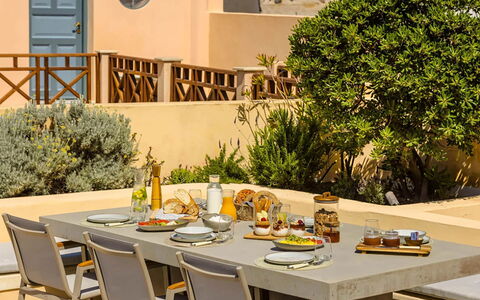 Villa Jasmine: Furniture, Table, Chair, Outdoor Furniture, Kitchen & Dining Room Table, Outdoor Table, Restaurant, Houseplant, Patio, Garden