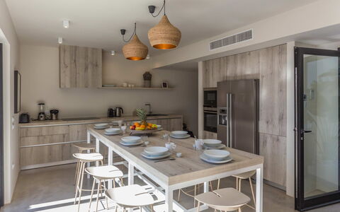 Villa Kiribati: Furniture, Interior Design, Flooring, Wood, Kitchen, Ceiling, Floor, Countertop, Kitchen & Dining Room Table, Light Fixture