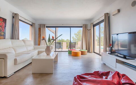 Villa Luanda: Furniture, Floor, Couch, Apartment, Chair, Living Room, Resort, Shade, Hardwood