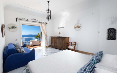 Villa Magnolia: Blue, Furniture, Floor, Flooring, Interior Design, Sea, Chair, Apartment, Resort, Ocean