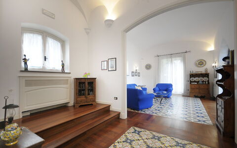 Villa Marion: Flooring, Interior Design, Wall, Furniture, Floor, Wood, Ceiling, Lighting, Room, Living Room