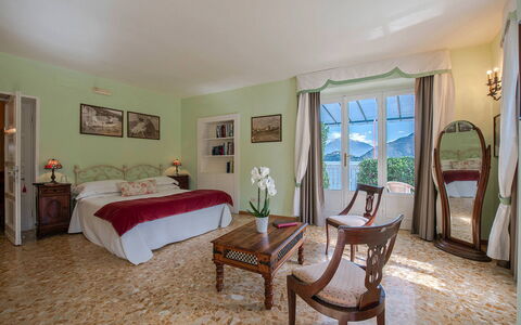 Villa Meridiana: Furniture, Interior Design, Room, Bed, Bedroom, Home, Picture Frame, Linens, Pillow, Chair