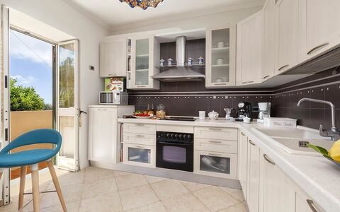 Villa Mouna: Kitchen Appliance, Kitchen, Countertop, Major Appliance, Cabinetry, Furniture, Interior Design, Home Appliance, Wood, Flooring