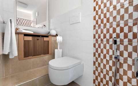 Villa Mouna: Flooring, Plumbing Fixture, Interior Design, Bathroom, Toilet Seat, Floor, Toilet, Tile, Plumbing, Sink