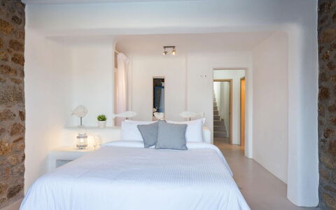 Villa Paradeisos: Wall, Interior Design, Bedroom, Bed, Furniture, Ceiling, Home, Lighting, Bedding, Room