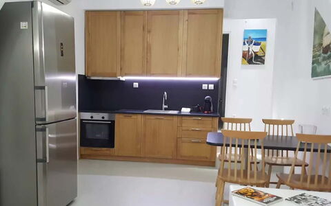 Villa Pirgi: Furniture, Flooring, Kitchen Appliance, Major Appliance, Kitchen, Wood, Interior Design, Floor, Countertop, Chair