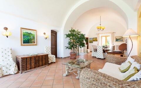 Villa Polluce: Furniture, Flooring, Flowerpot, Houseplant, Chair, Kitchen & Dining Room Table, Living Room, Dining Room, Vase, Coffee Table