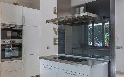 Villa Roja: Kitchen, Interior Design, Countertop, Kitchen Appliance, Flooring, Major Appliance, Cabinetry, Floor, Home, Ceiling