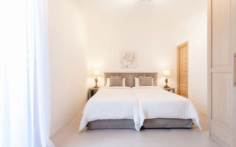 Villa Smaràgdi: Furniture, Interior Design, Bed, Bedroom, Wood, Floor, Flooring, Room, Ceiling, Bedding