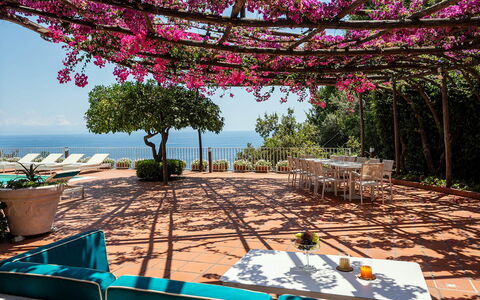 Villa Sole di Amalfi: Furniture, Sea, Outdoor Furniture, Coastal And Oceanic Landforms, Table, Resort, Ocean, Chair, Coast