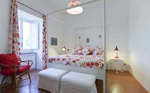 Villa Torre del Sole: Furniture, Interior Design, Bed, Bedroom, Wall, Floor, Flooring, Room, Ceiling, Wood