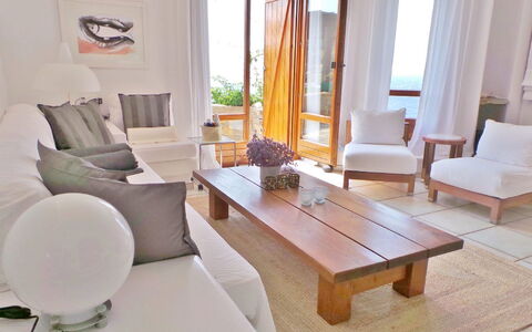 Villa Zenas with Direct Access to the Sea: Furniture, Interior Design, Couch, Flooring, Floor, Wood, Living Room, Room, Table, Throw Pillow