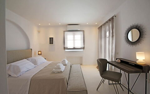 Villa Zinovia: Furniture, Interior Design, Bed, Wall, Bedroom, Flooring, Floor, Ceiling, Room, Lighting