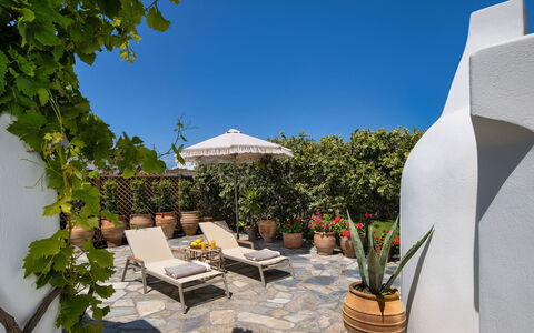 Guest House Sorokos: Flowerpot, Houseplant, Garden, Flagstone, Outdoor Furniture, Landscaping, Chair, Courtyard, Shade