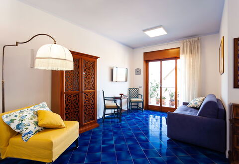 Casa Serena: Blue, Flooring, Floor, Interior Design, Tile, Room, Wood Stain, Wood Flooring, Living Room