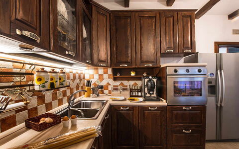 Villa Pandora: Kitchen, Kitchen Appliance, Countertop, Major Appliance, Wood, Interior Design, Cabinetry, Kitchen Stove, Furniture, Flooring