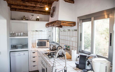 Villa Rigel: Kitchen, Countertop, Interior Design, Kitchen Appliance, Ceiling, Furniture, Flooring, Kitchen Stove, Room, Major Appliance