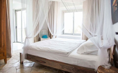 Villa Rigel: Furniture, Interior Design, Bedroom, Bed, Wood, Floor, Linens, Textile, Canopy Bed, Bedding