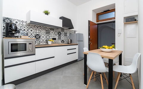 Apartment Vittoria: Interior Design, Kitchen, Furniture, Flooring, Countertop, Floor, Home, Kitchen Appliance, Room, Cabinetry