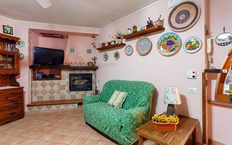 Villa Due Golfi: Furniture, Interior Design, Wood, Flooring, Room, Floor, Lighting, Home, Living Room, Picture Frame