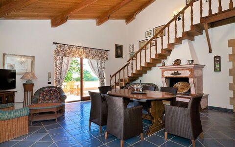 Villa Lo Capo: Furniture, Flooring, Interior Design, Wood, Floor, Chair, Table, Ceiling, Couch, Living Room