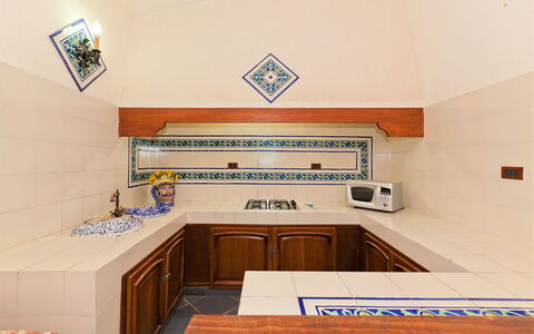Villa Lo Capo: Flooring, Interior Design, Floor, Kitchen, Ceiling, Countertop, Tile, Room, Wood Stain, Cabinetry