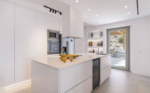 The Mykonian Castle: Kitchen, Countertop, Kitchen Appliance, Interior Design, Cabinetry, Furniture, Flooring, Wood, Floor, Ceiling