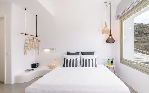 The Mykonian Castle: Bedroom, Interior Design, Bed, Lighting, Apartment, Throw Pillow, Linens, Furniture, Home, Pillow