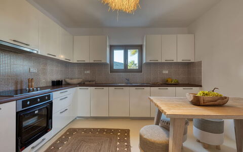 Villa Almatea: Interior Design, Kitchen, Furniture, Countertop, Flooring, Kitchen Appliance, Wood, Cabinetry, Ceiling, Floor