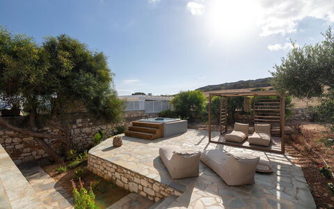 Villa Ayra: Furniture, Outdoor Furniture, Flagstone, Shade, Garden, Stone Wall, Chair, Landscaping, Backyard, Patio
