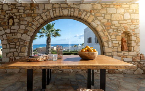 Villa Ayra: Furniture, Wall, Table, Interior Design, Chair, Kitchen & Dining Room Table, Arch, Stone Wall, Dining Room, Outdoor Table