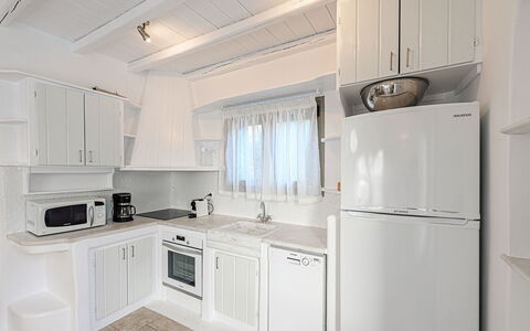 Villa Valentine: Kitchen, Kitchen Appliance, Major Appliance, Furniture, Interior Design, Countertop, Cabinetry, Flooring, Home Appliance, Refrigerator