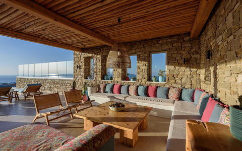 Villa Joy: Wall, Wood, Furniture, Architecture, Stone Wall, Chair, Brick, Resort, Living Room