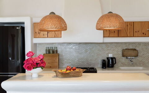 Villa Joy: Furniture, Kitchen, Countertop, Interior Design, Wood, Light Fixture, Cabinetry, Flooring, Lighting, Kitchen Appliance