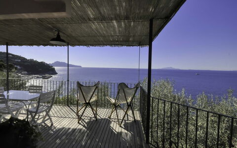 Casa Lubrense: Coast, Sea, Coastal And Oceanic Landforms, Balcony, Ocean, Shore, Outdoor Furniture, Chair, Bay, Resort