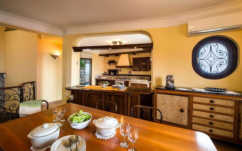 Villa Tortuga: Furniture, Interior Design, Countertop, Kitchen, Wood, Ceiling, Flooring, Lighting, Kitchen & Dining Room Table, Table