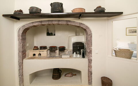 Palea: Interior Design, Furniture, Shelving, Shelf, Room, Natural Material, Kitchen, Hearth, Stove, Wood Stain