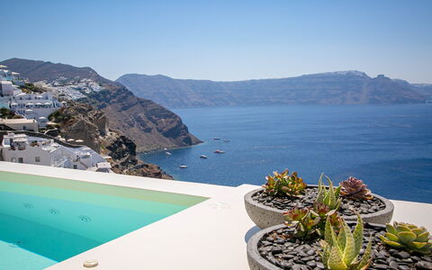 Mide: Blue, Flowerpot, Chair, Swimming Pool, Houseplant, Eco Hotel, Resort, Outdoor Furniture, Villa, Hotel